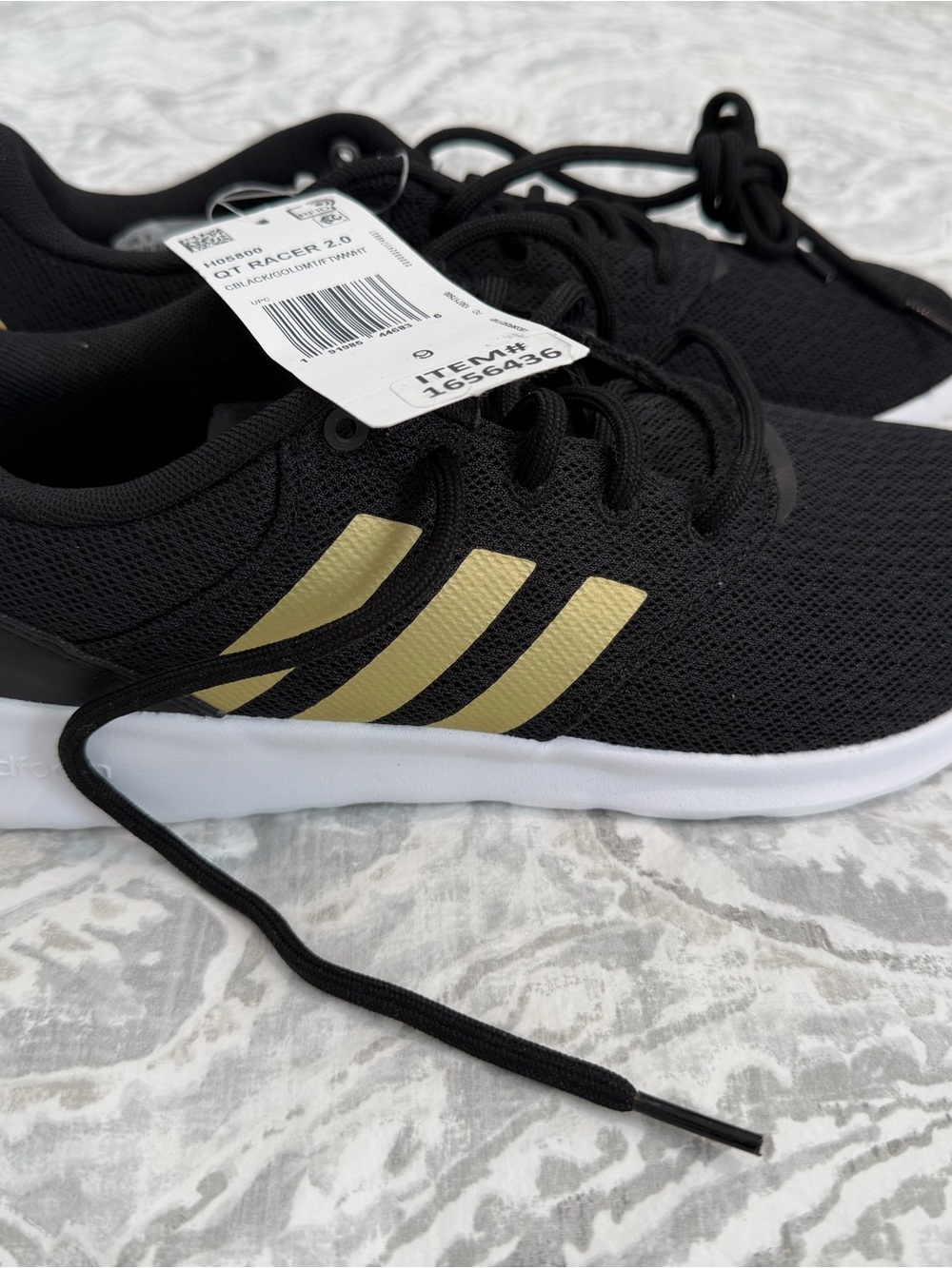 adidas Men's Black Athletic Shoes with Gold Stripes